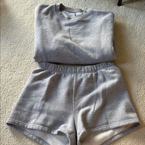 TNA cozy sweatshorts and crewneck set in grey.